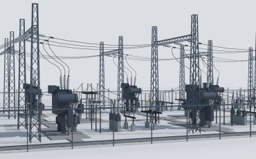 Industrial electrical substation with transformers and power lines.